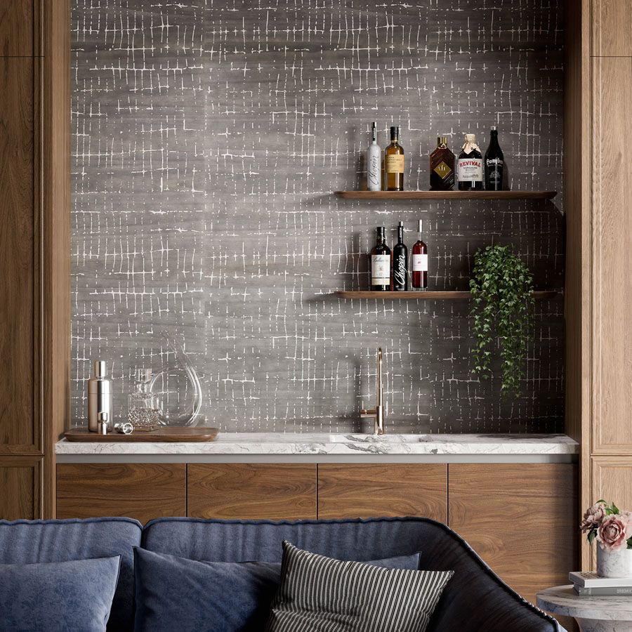 Cypress is made of natural wood veneers, richly dyed, then laser cut and applied to a silver metallic backing. Reminiscent of trailing water drops, the organic geometric pattern elevates Cypress’ natural woodgrain into a glamorous, inspired material. Balancing matte and metallic with laser cut precision, the wallcovering is available in refined neutrals and a striking black colorway designed for fresh and elegant feature walls.